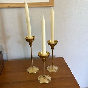 Three Brass Candle Sticks with 3 Beige Tapers